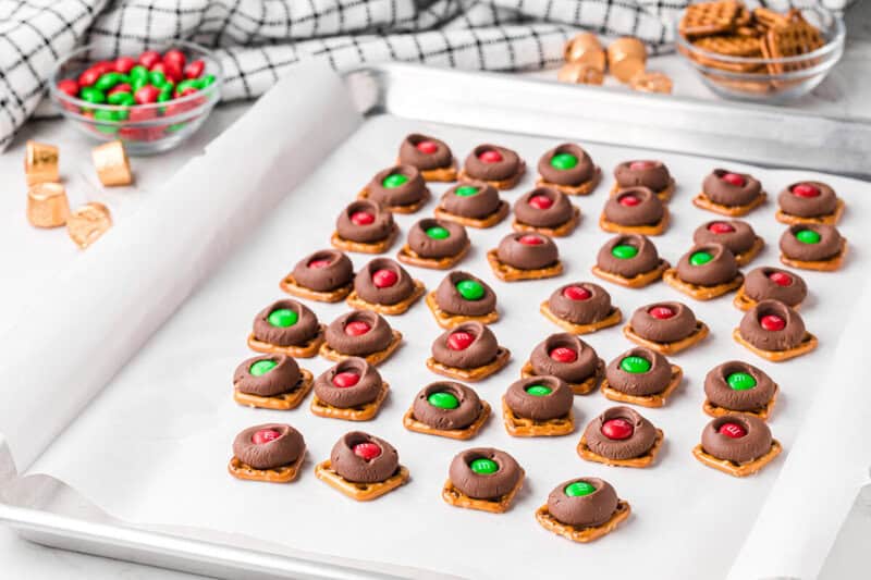 Rolo Pretzels setting on a baking sheet.