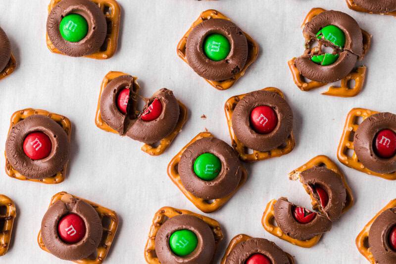 closeup of the Rolo Pretzels with some cut in half to show the caramel.