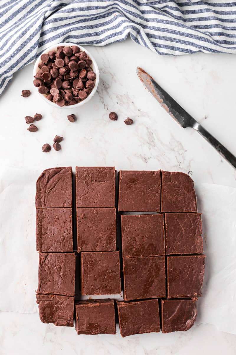 the fudge cut into slices on the counter.
