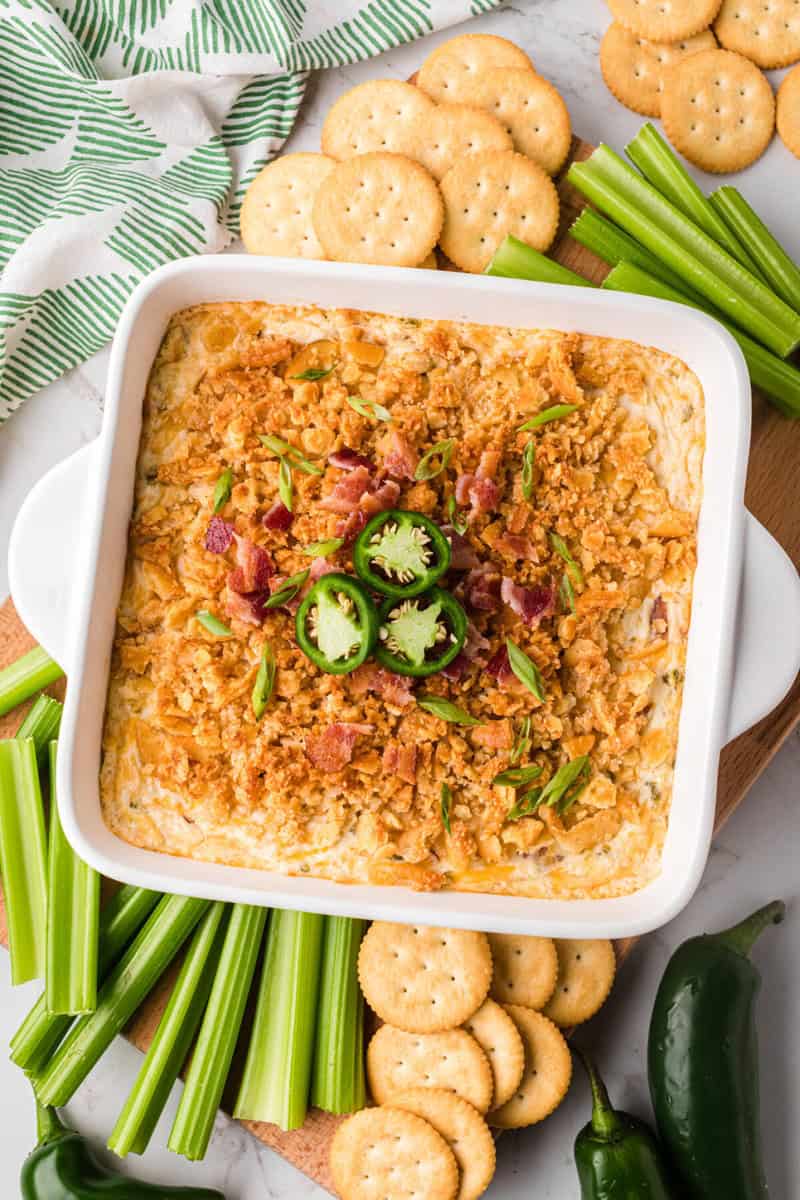 Jalapeno Popper Dip in white casserole dish.