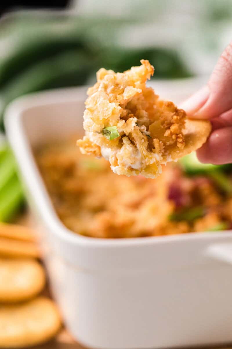 Closeup of the Jalapeno Popper Dip on a Ritz Cracker.
