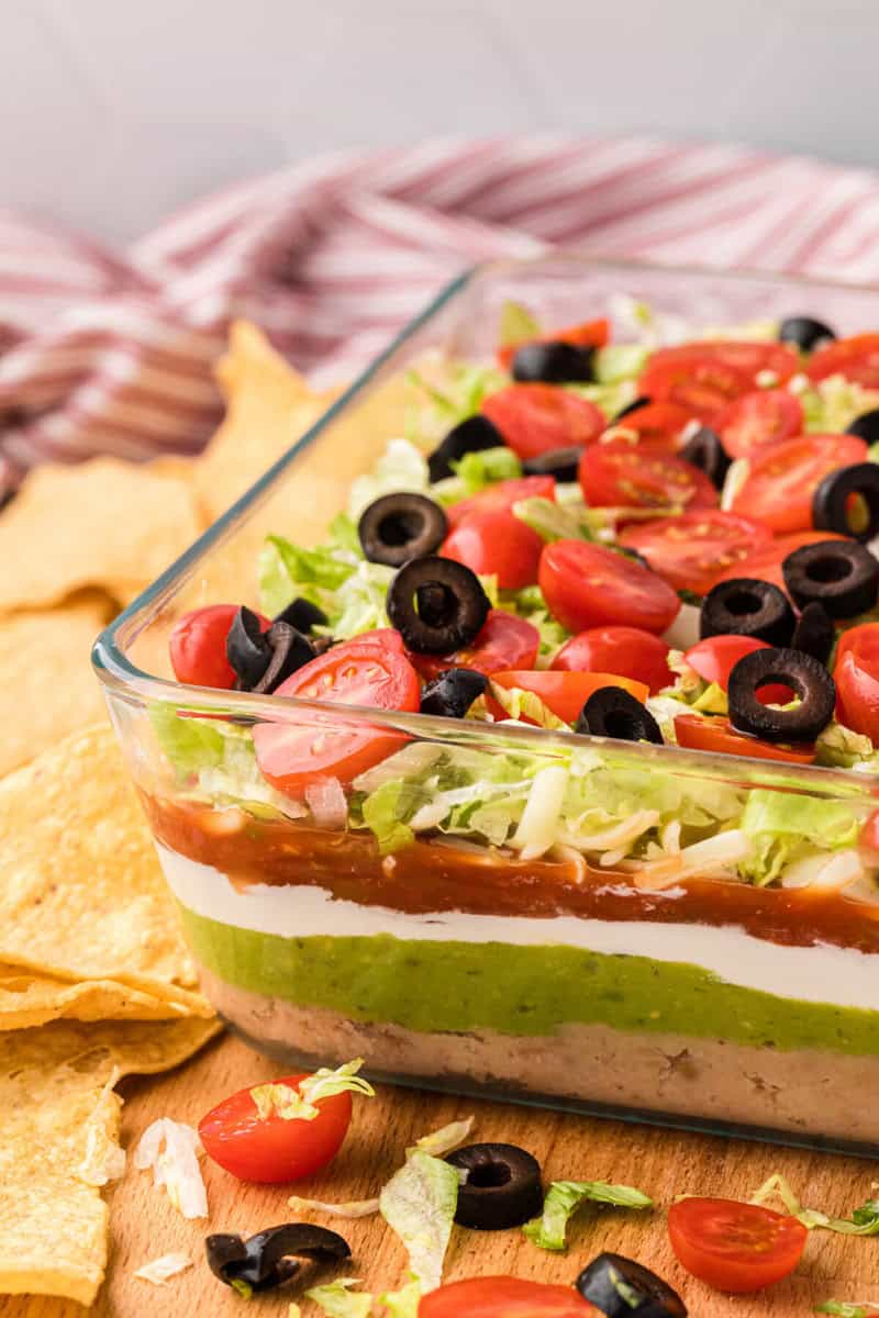 7 Layer Dip in a clear dish.