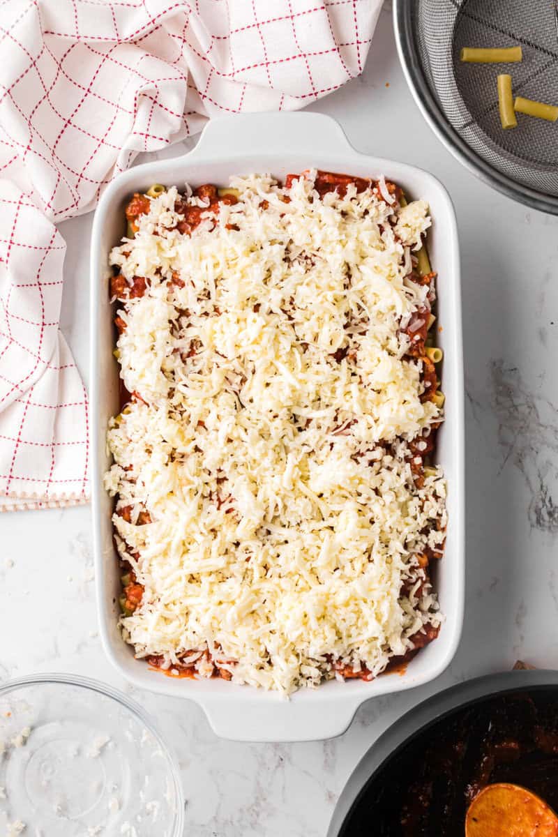 topping the Baked Ziti with shredded mozzarella before baking.