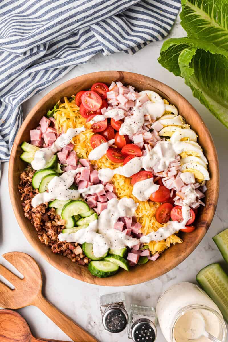 ranch dressing drizzled on top of the Chef Salad.