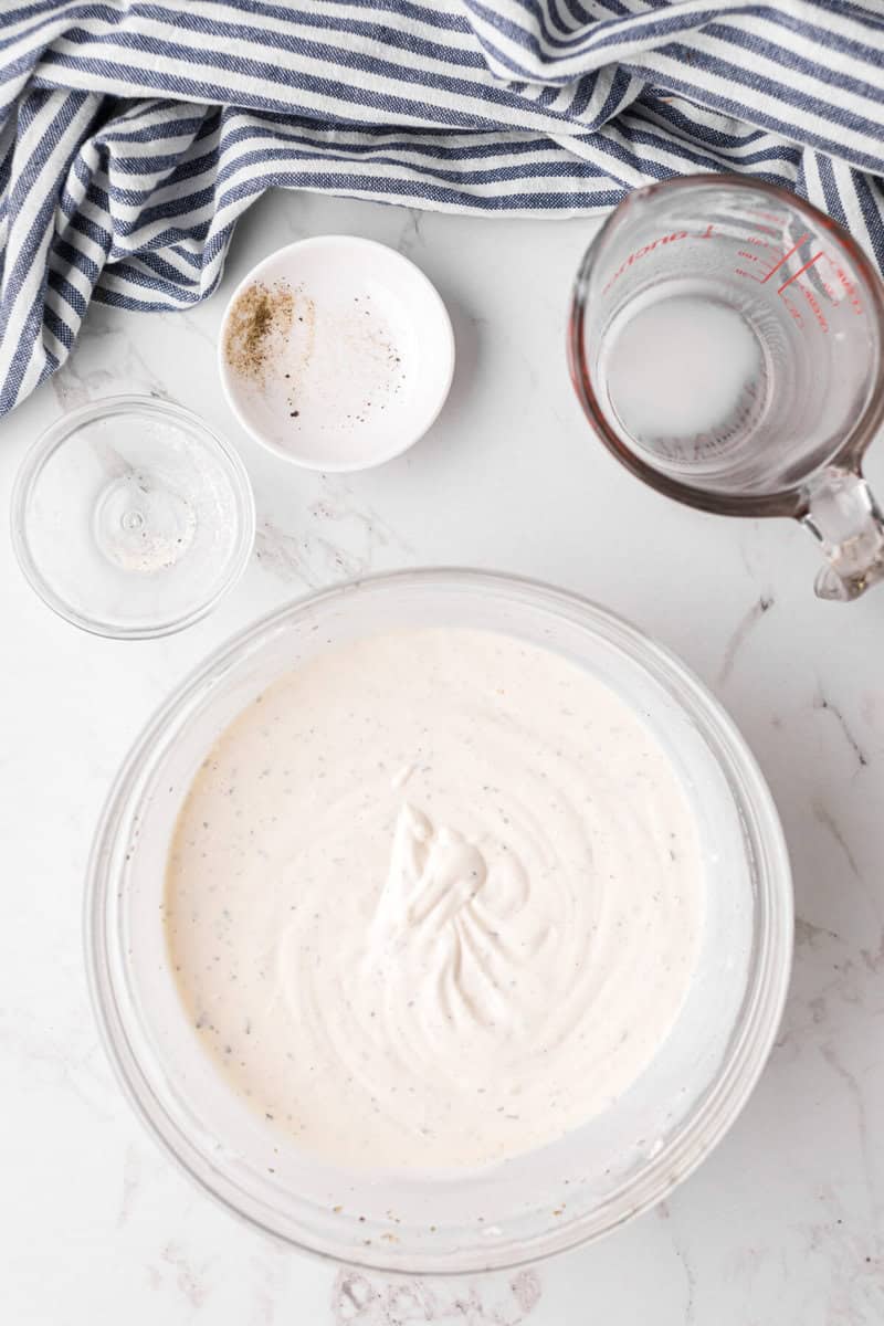 ranch dressing in a large glass bowl.