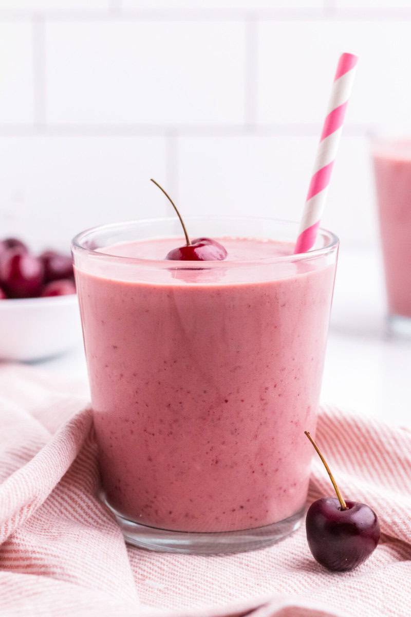 closeup of a glass of the cherry smoothie.