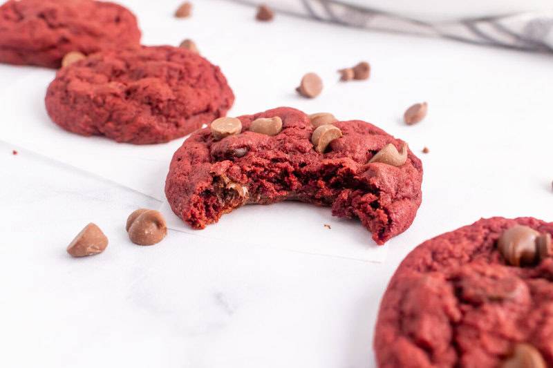closeup of a cookie with a bite taken out of it.