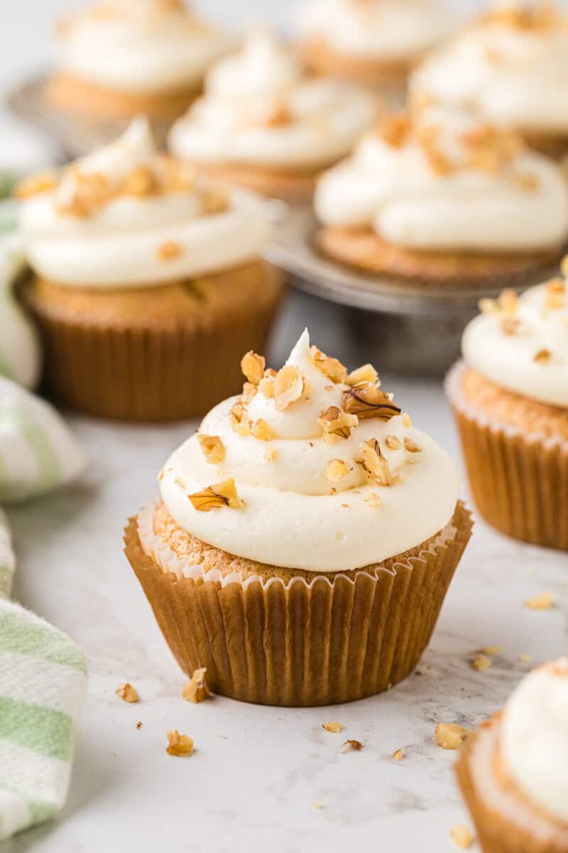 closeup of a finished carrot cake cupcake.