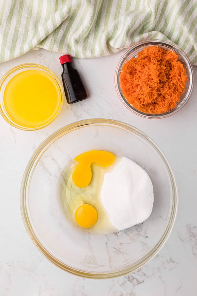adding the wet ingredients to a large glass bowl.