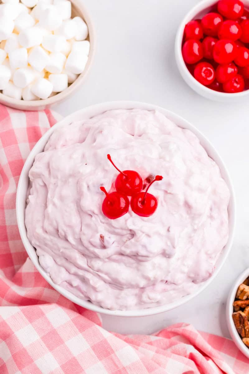 top-down view of the Cherry Fluff with maraschino cherries on top.