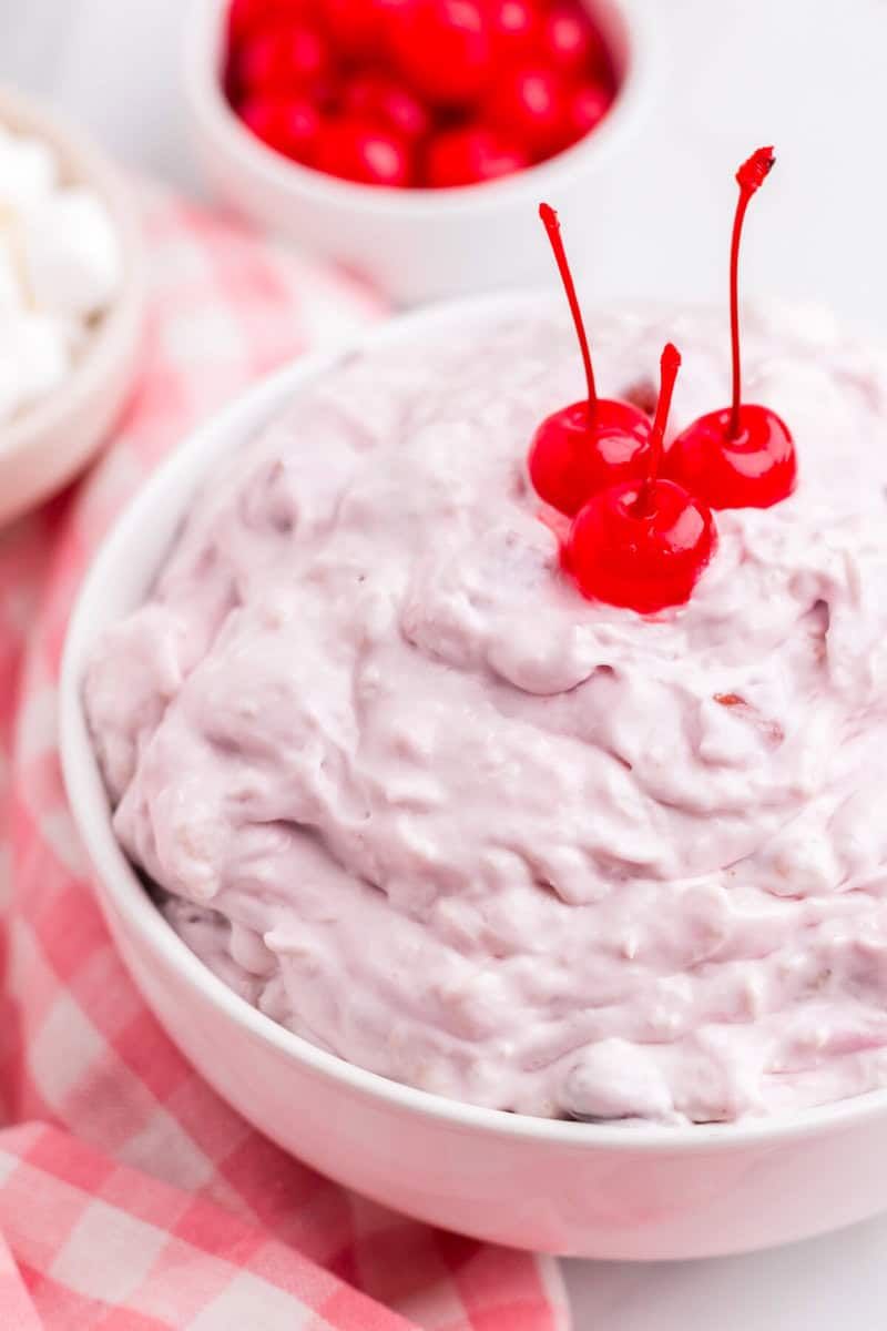 closeup of the Cherry Fluff with maraschino cherries on top.