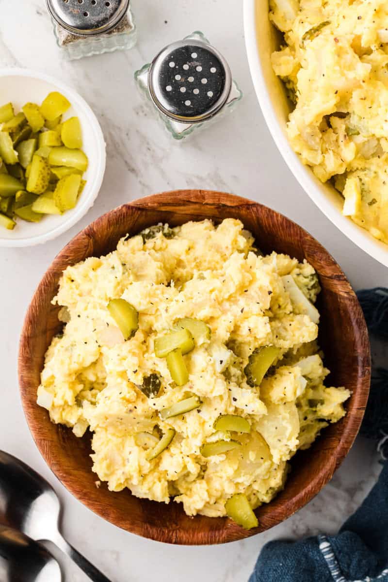 top-down view of the potato salad in a wooden serving bowl.