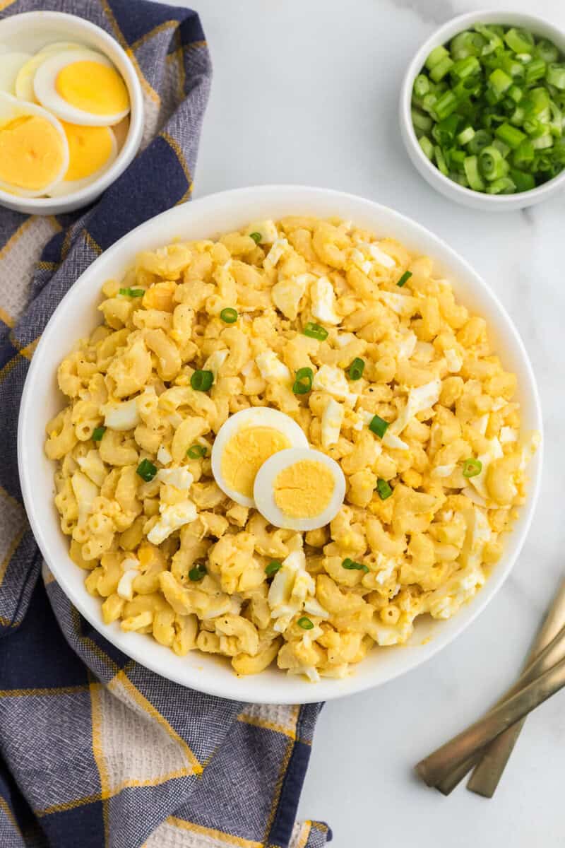 top-down view of the Deviled Egg Pasta Salad in white serving bowl.