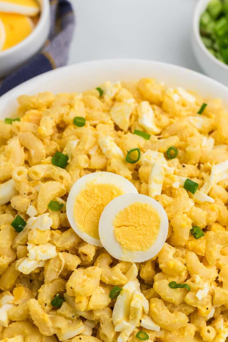 closeup of the Deviled Egg Pasta Salad with hard-boiled eggs slices on top.