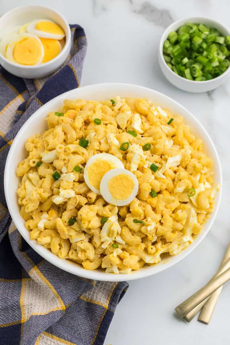 Deviled Egg Pasta Salad in white serving bowl.