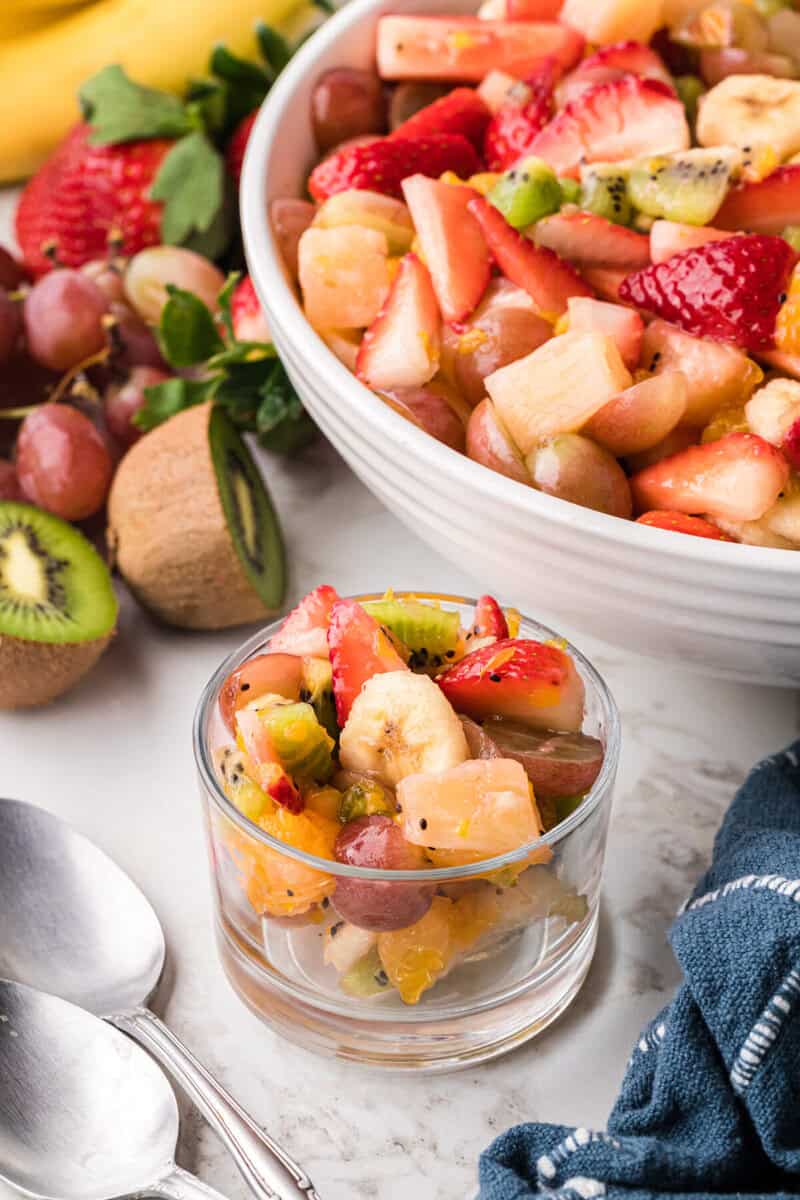 fruit salad served in a small glass bowl.