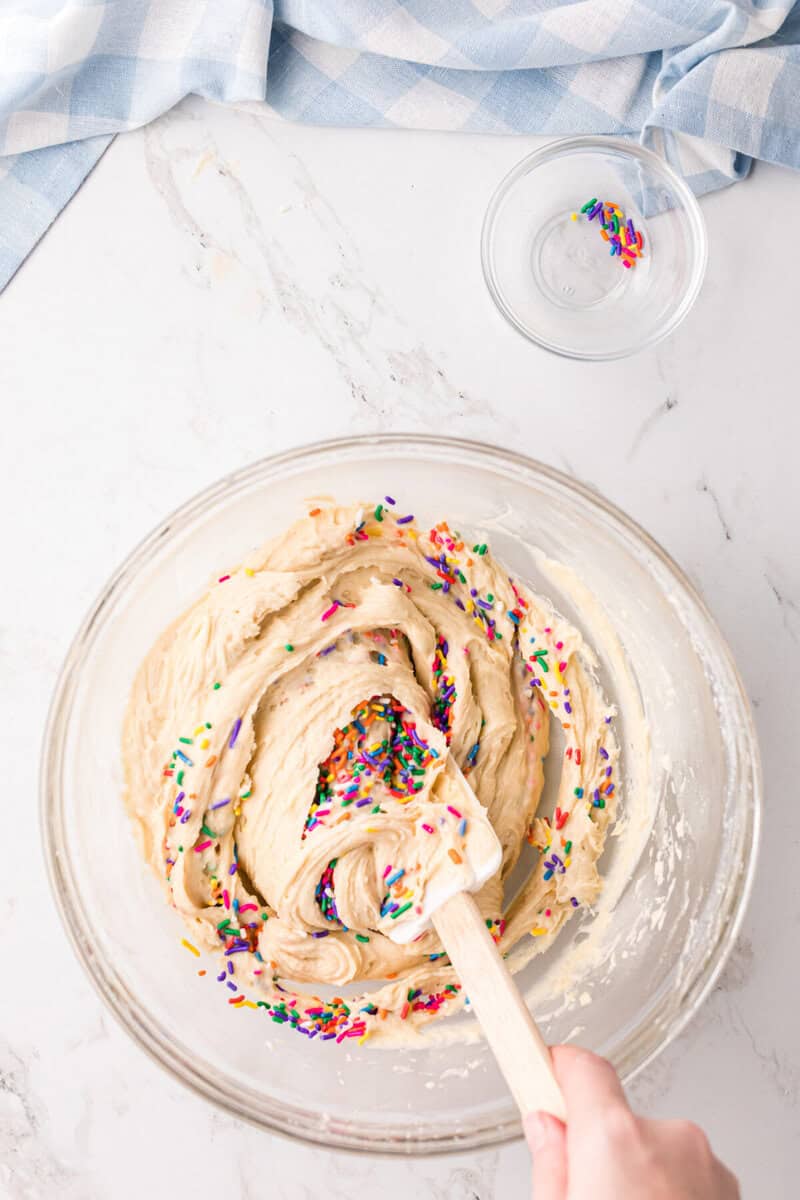 folding in the sprinkles for the Funfetti Cupcakes.