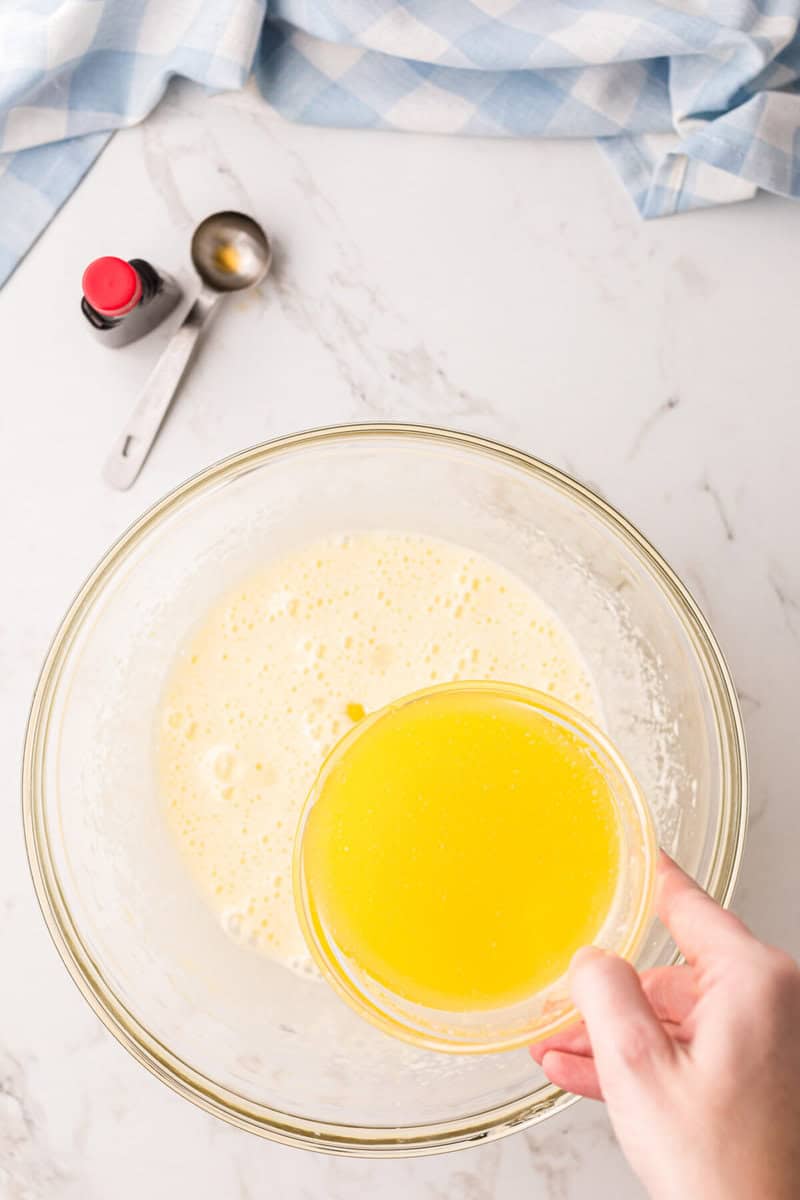 mixing together the butter with the other wet ingredients for the cupcakes.