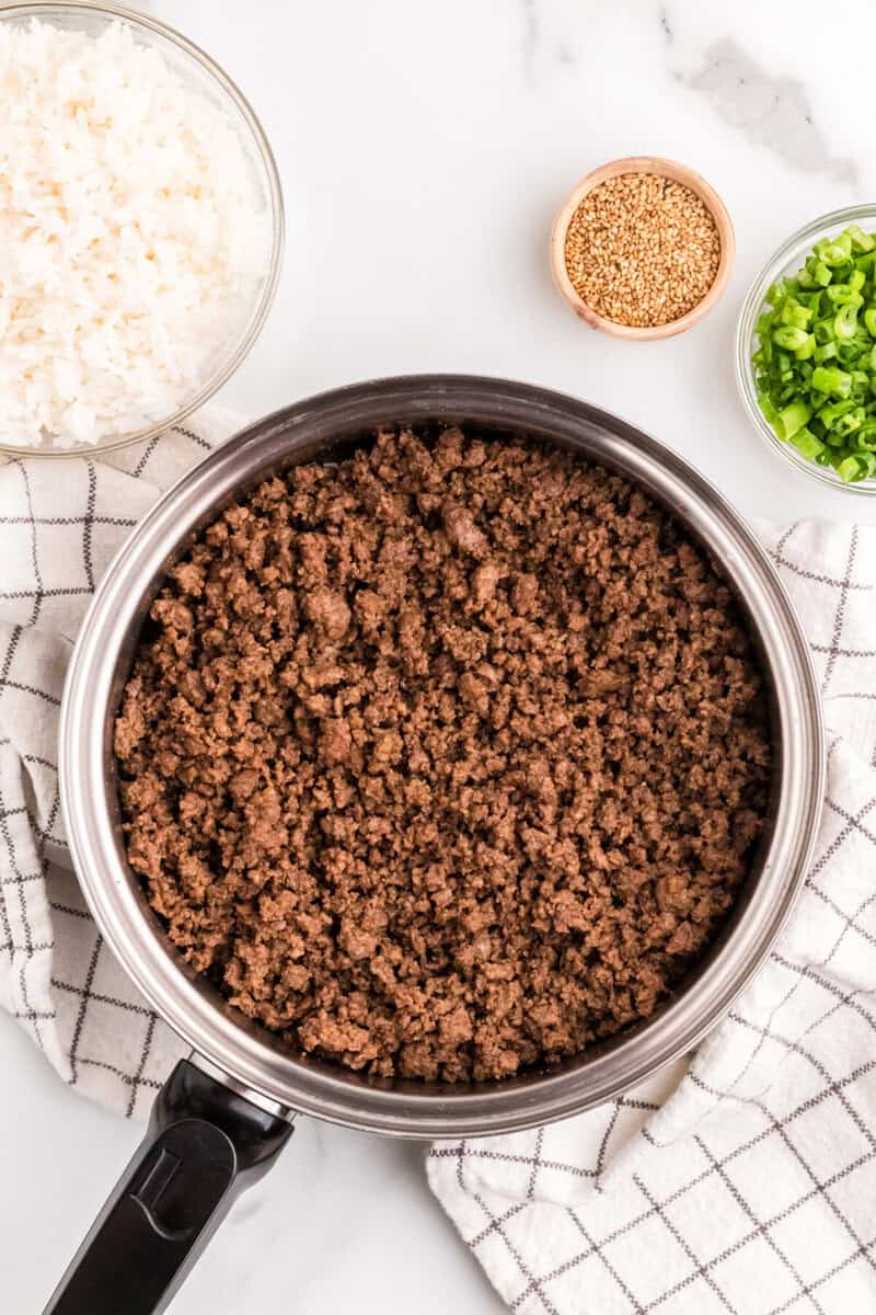 cooked Asian Ground Beef in a saucepan.