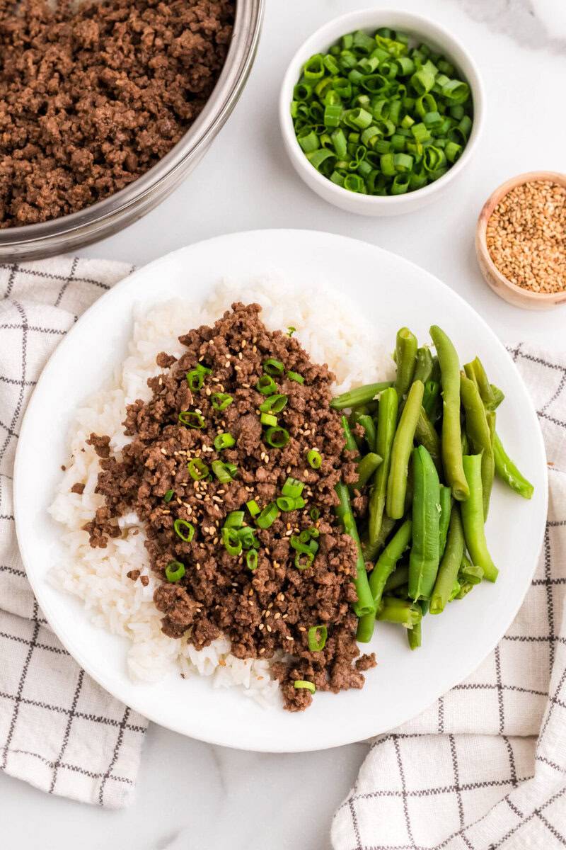 top-down view of the Asian Ground Beef served with green beans.