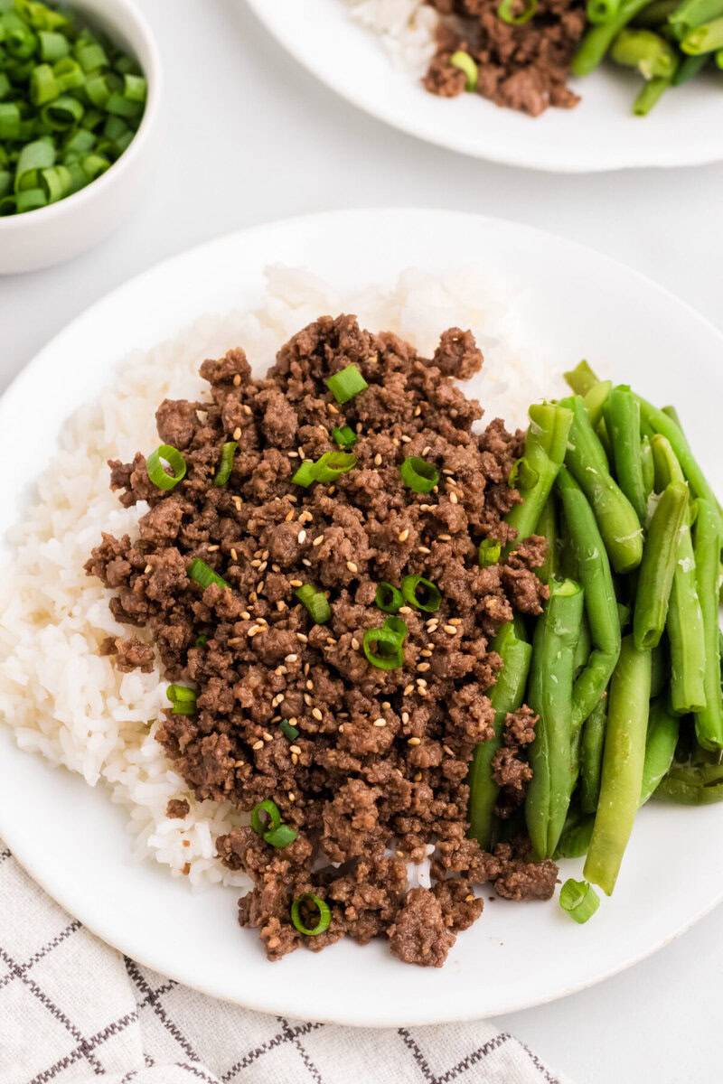 Asian ground beef served with rice and green beans.