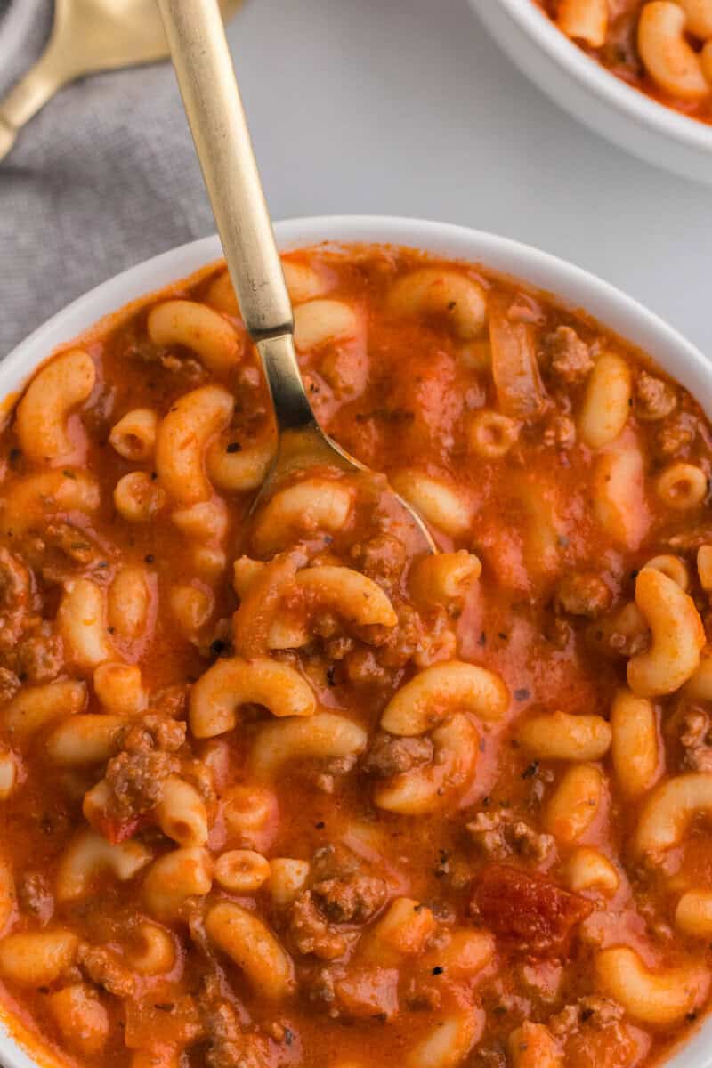 closeup of a bowl of the beef and macaroni soup.