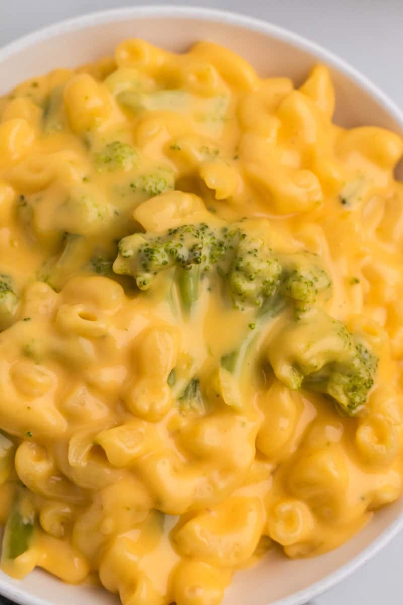 closeup of the Broccoli Mac and Cheese in a white bowl.