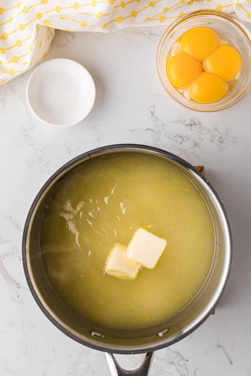 adding the butter for the lemon filling.