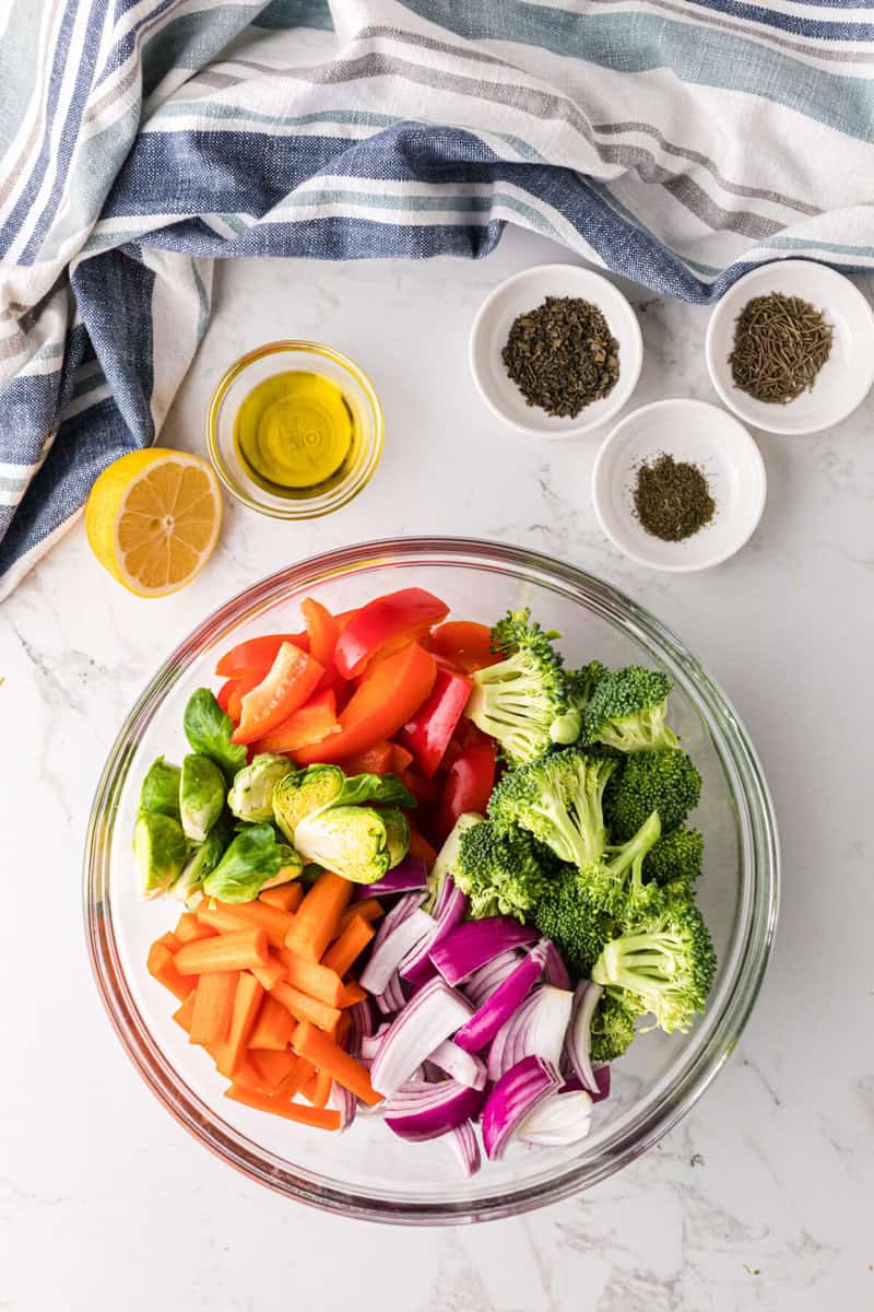 veggies in a large mixing bowl to oil and season.