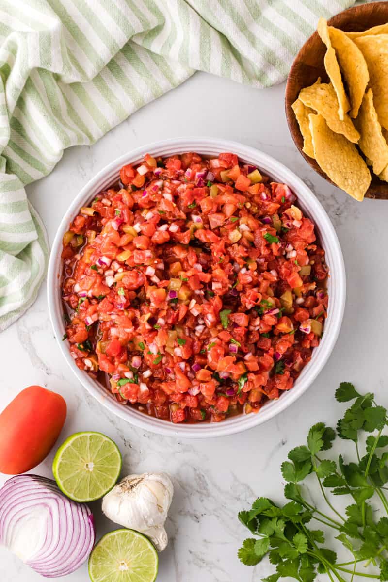 the salsa mixed together in a large white serving bowl.