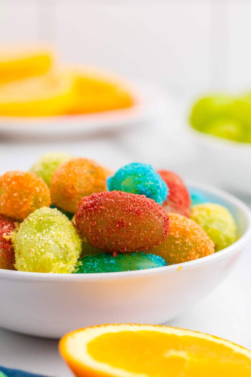 Sour Patch Grapes in a white serving bowl.