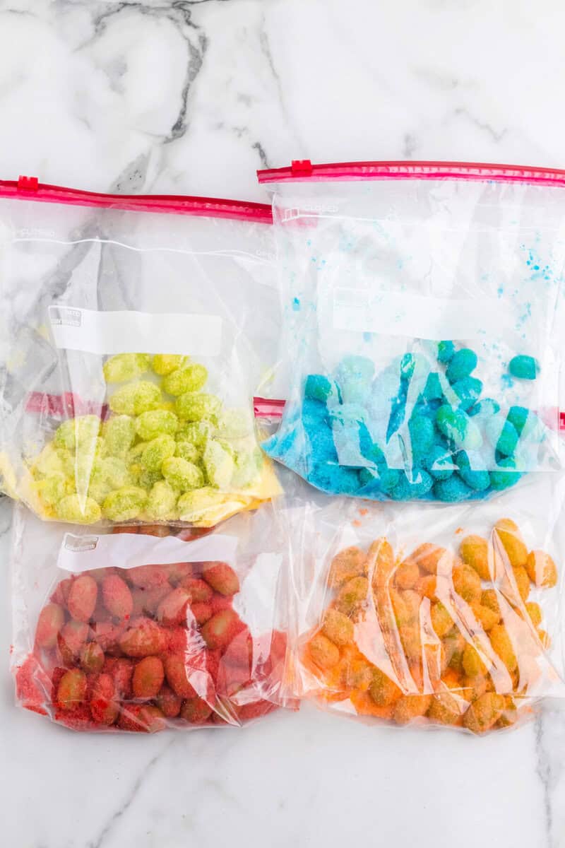adding the grapes to the Jell-O baggies.