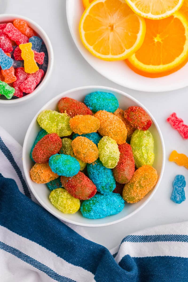 closeup of the Sour Patch Grapes in a white serving bowl.