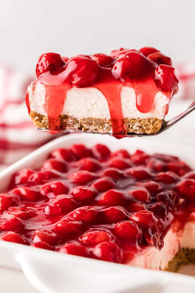 serving a slice of the Cherry Delight.