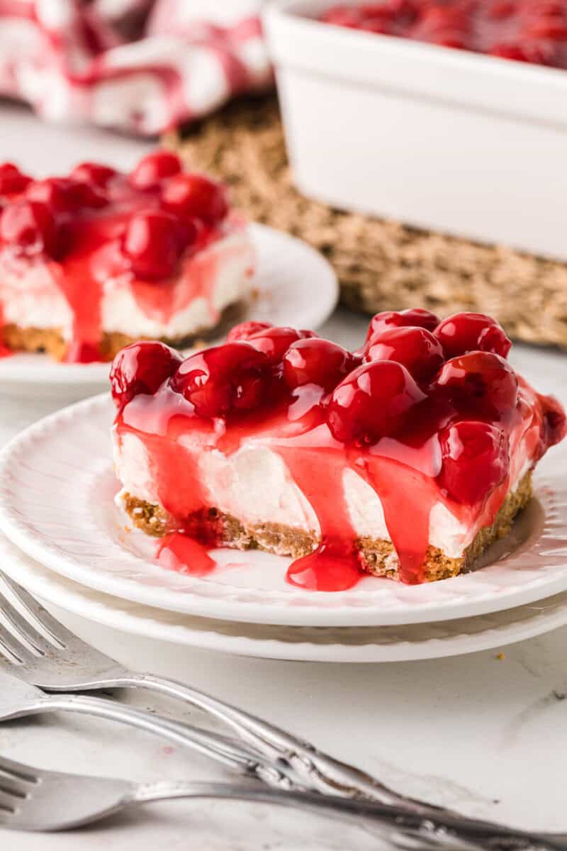 a slice of the Cherry Delight of a white plate.