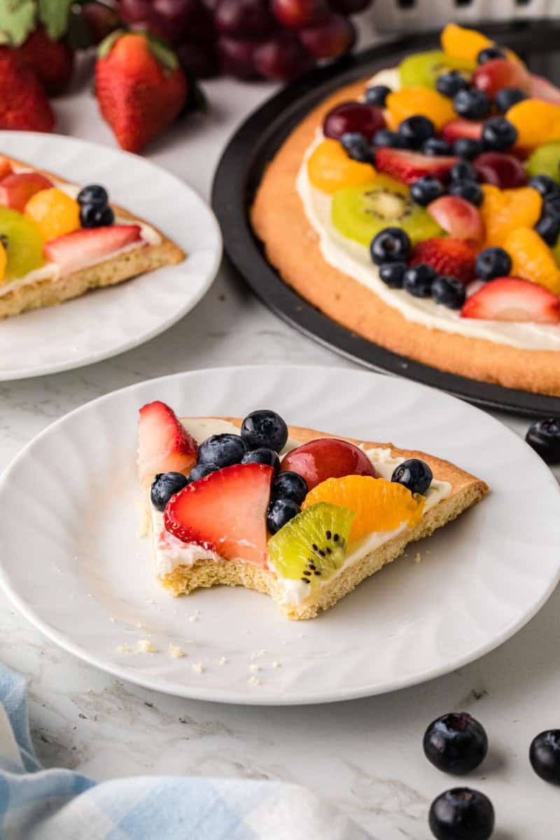 slice of the Fruit Pizza served on a white plate.