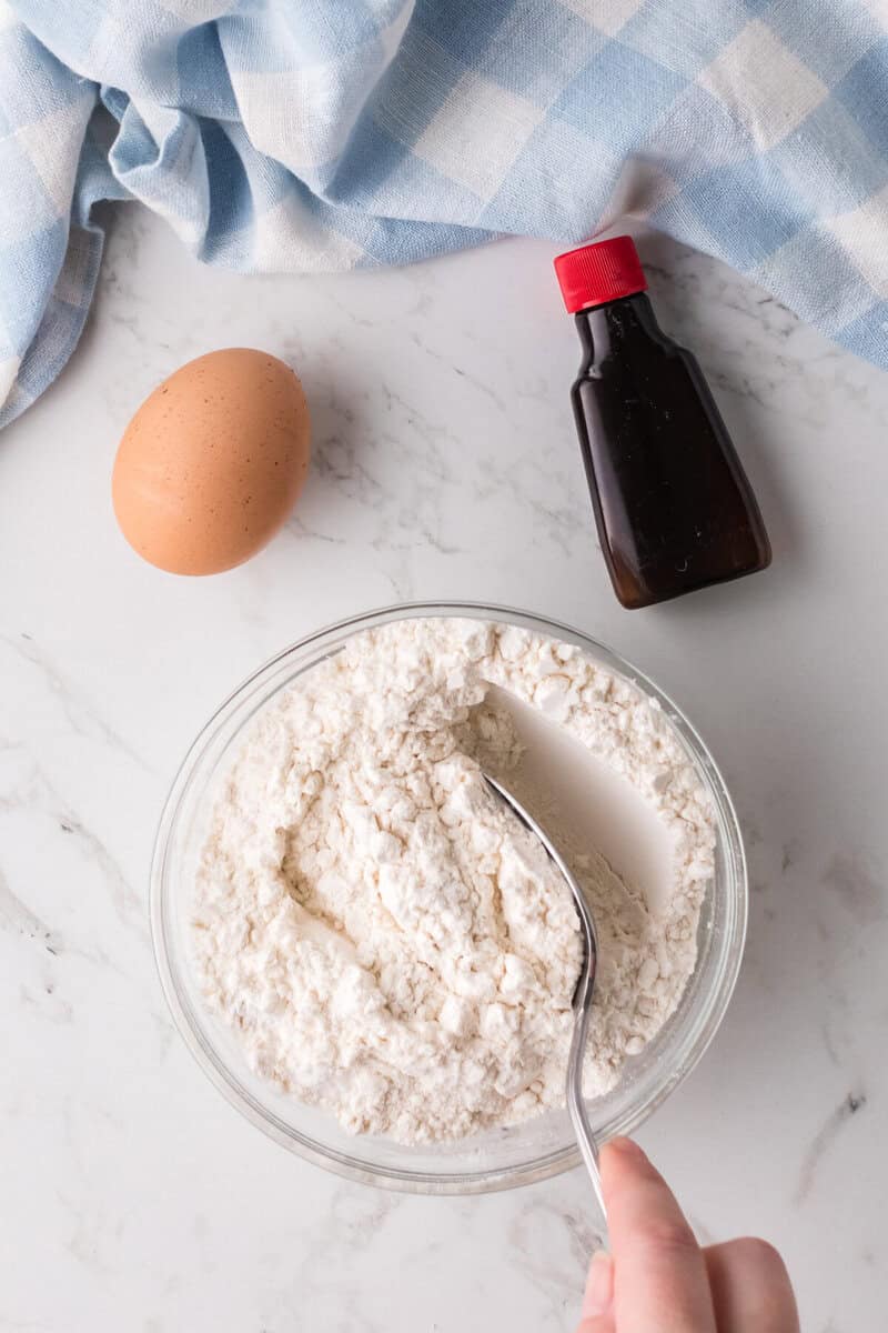 mixing the dry ingredients for the crust.