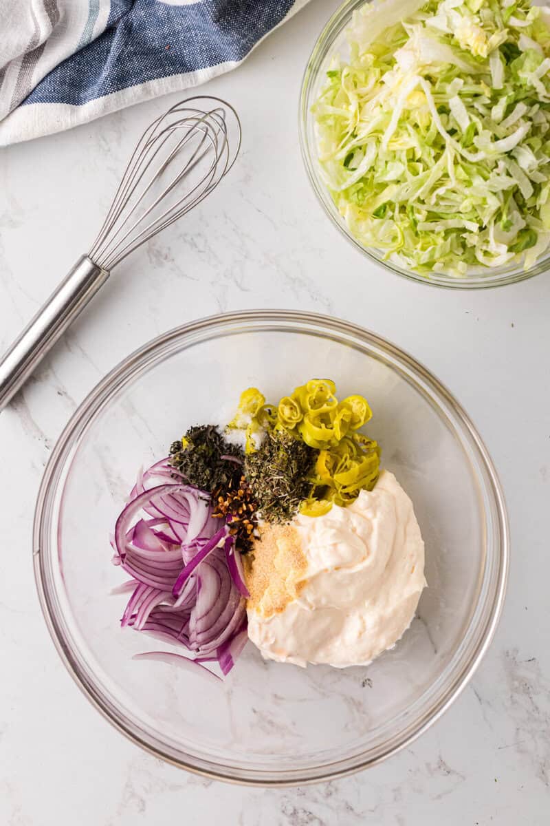 mixing the ingredients for the dressing.