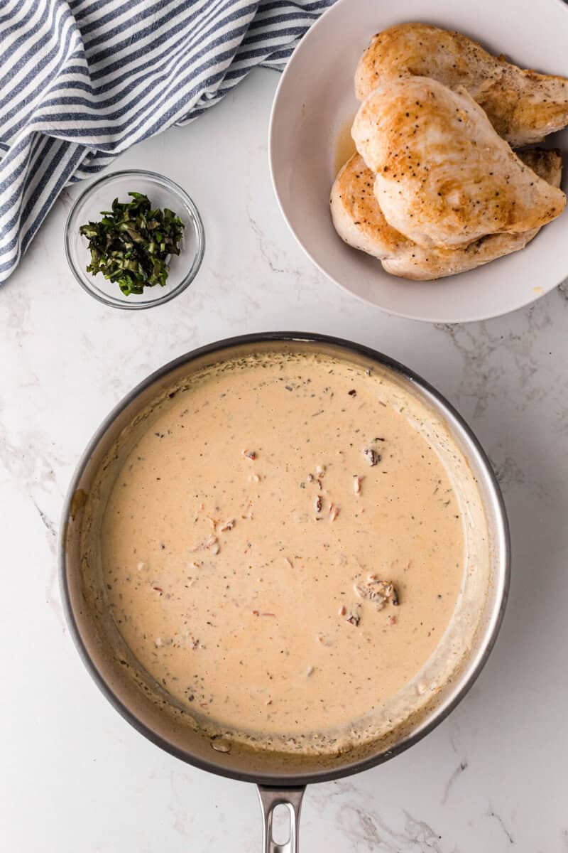 cream sauce cooking in the skillet.