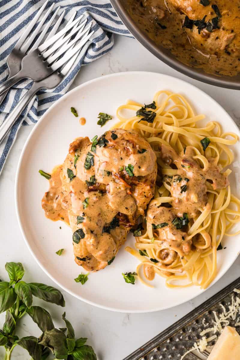 serving the Marry Me Chicken with fettuccini noodles.