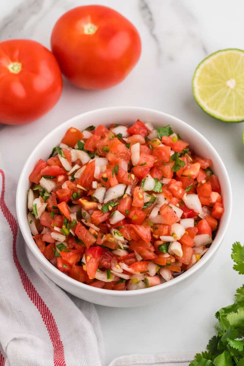 closeup of the Pico de Gallo served in a white bowl.