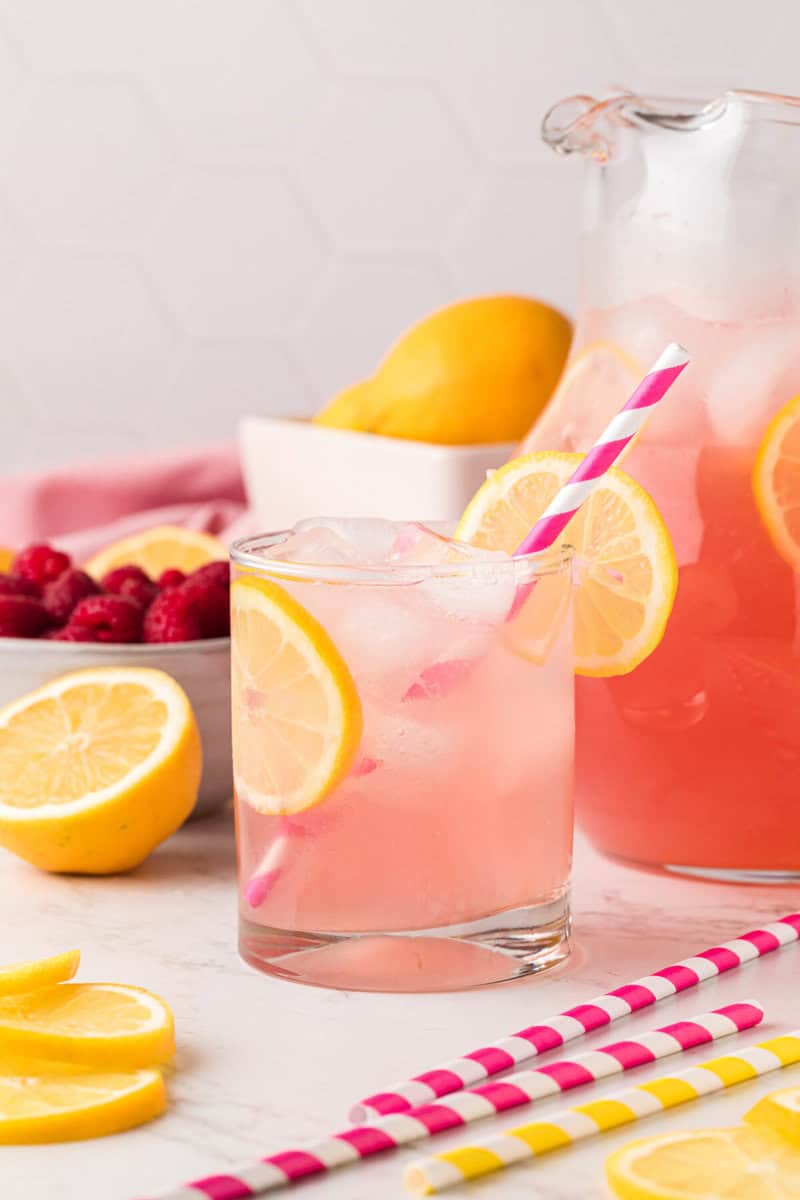 closeup of the pink lemonade in a glass.