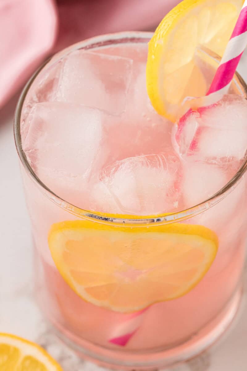 top-down closeup of the pink lemonade in a glass.