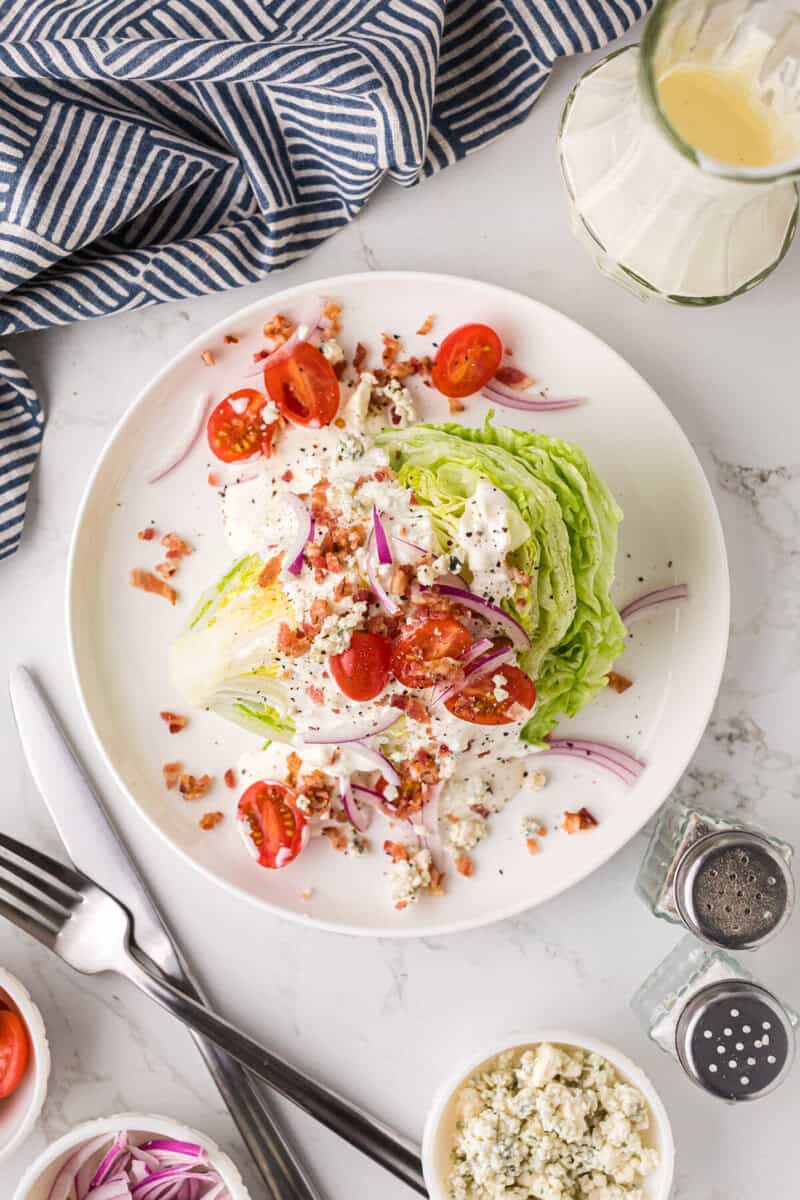 top-down view of the Wedge Salad on served on a white plate.