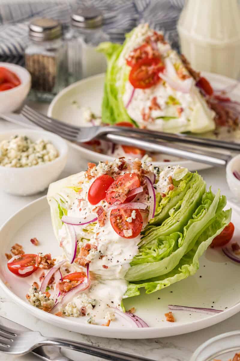 closeup of the Wedge Salad served on a white plate.