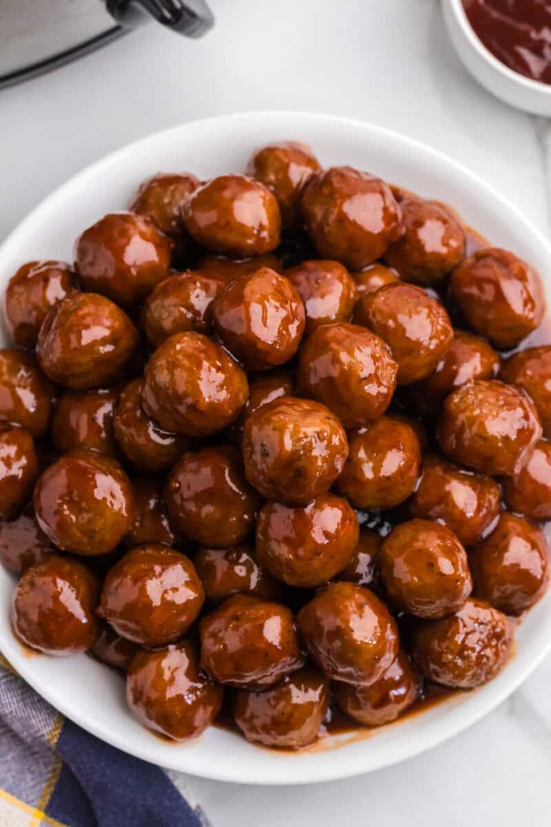 large white bowl of BBQ meatballs.