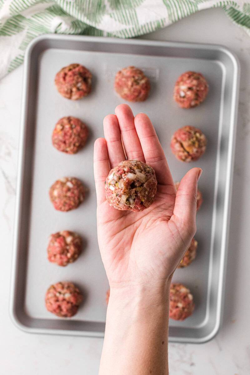 forming the meatballs in my hand and placing on the baking sheet.