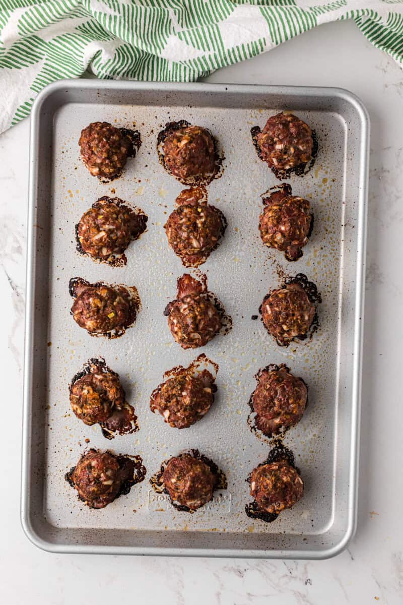 baked meatballs on the baking sheets.