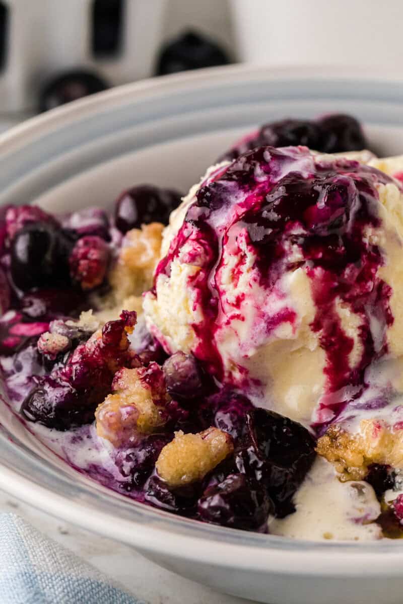 closeup of the blueberry cobbler and ice cream.