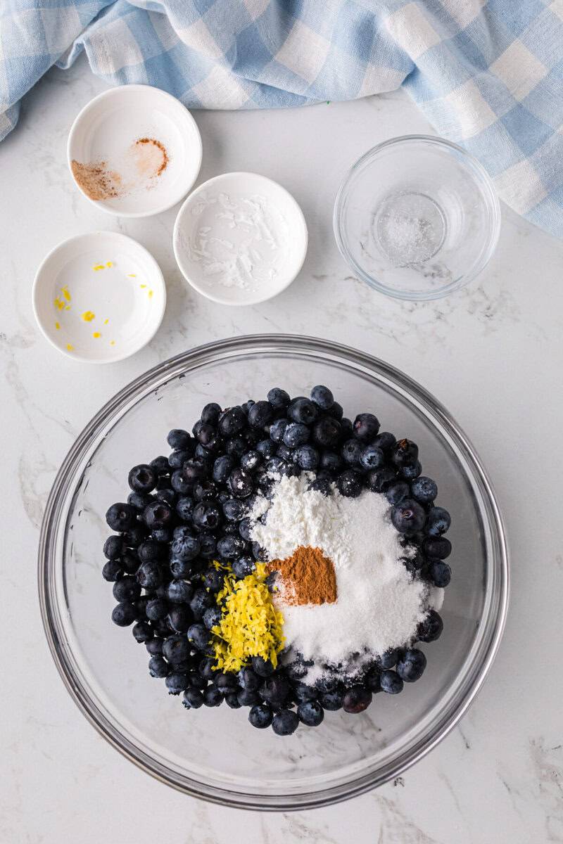 making the filling for the blueberry cobbler.